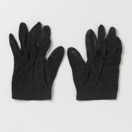 Right glove of black suede