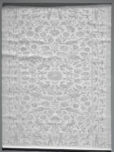 Napkin with scattered flowers, fruits and birds