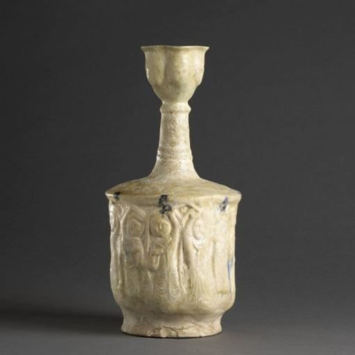 Ewer with dancing women and running beasts in relief