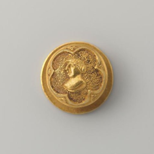 Gold shirt button with a man's portrait in a five-pointed star setting