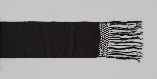 Mourning belt of broad black silk with plaitwork and fringe at the ends