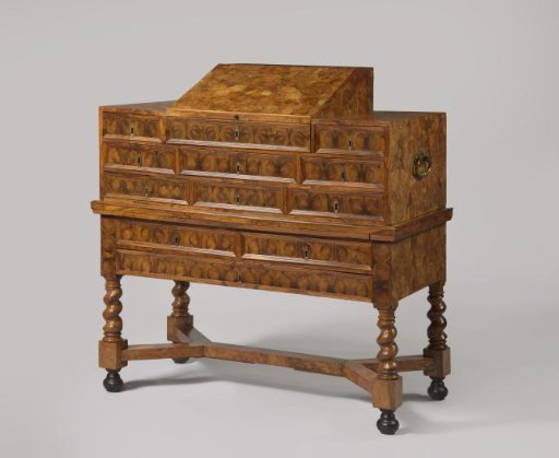 Reading stand of root and olive wood with drawers, on a stand with twisted legs