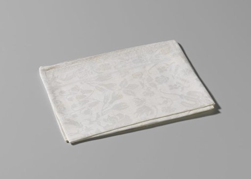 Napkin of white linen damask with the coupled coats of arms Von Inn- und Kniphausen and Von Ewsum
