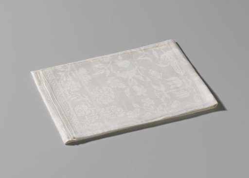 White linen damask napkin with the impaled coats of arms Von Inn- und Kniphausen and Van Ewsum