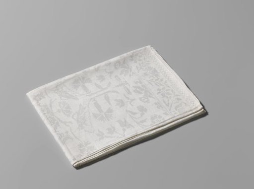 Tablecloth of white linen damask with the impaled arms of Von Inn- und Kniphausen and Van Ewsum