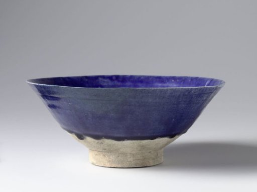 Bowl with an incised scroll border