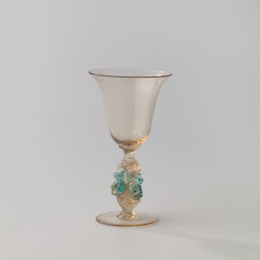 Chalice glass with tulip-shaped bowl and stem with three dolphins