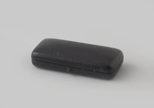 Rectangular jewel box covered with black leather