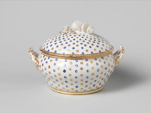 Tureen, painted with a regular sprig pattern of rosettes in blue and gold