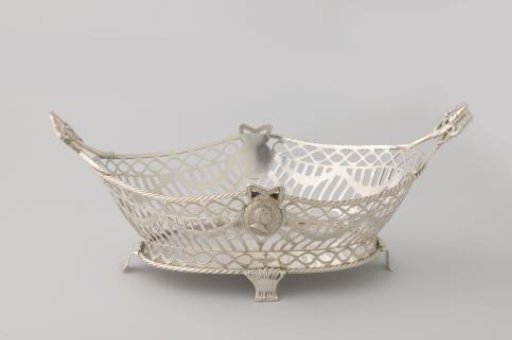 Bread basket with openwork arched wall with oval medallions with bow decoration