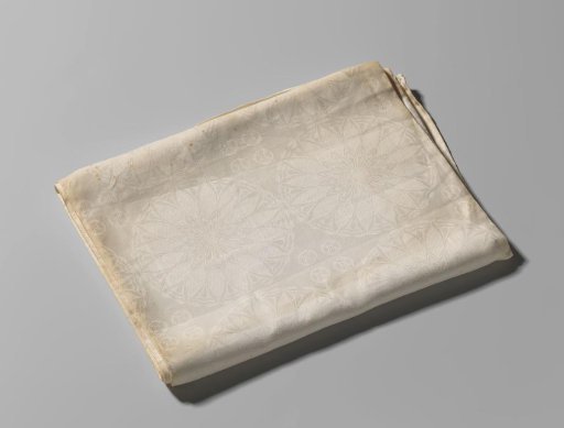 Tablecloth of white linen damask with the design 'Lotus'