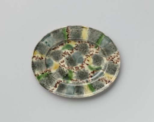Underplate of a Butter Boat, of Multicoloured Burnt Earthenware; Staffordshire
