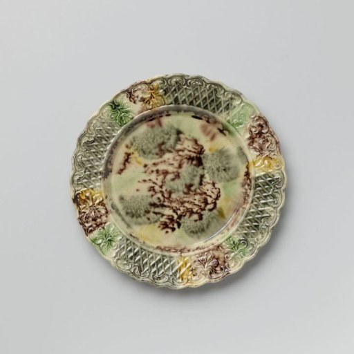 Plate of multicoloured stoneware; Staffordshire.