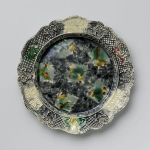 Round plate of hard-fired earthenware; Staffordshire