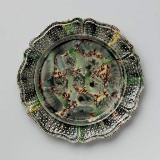 Plate of multicoloured hard-baked earthenware; Staffordshire