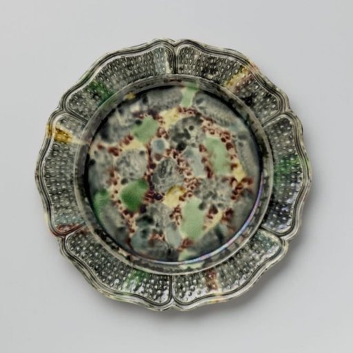 Plate of multicoloured stoneware; Staffordshire