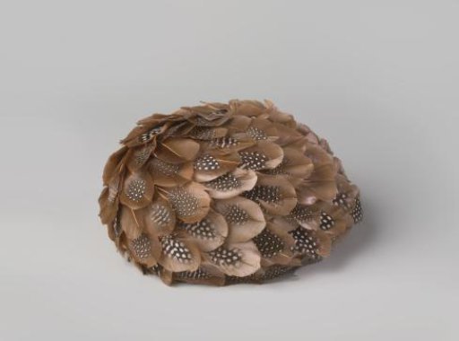 Ladies' hat entirely covered with guinea fowl feathers