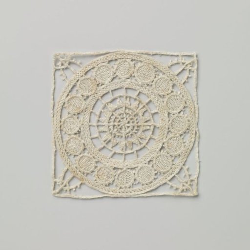 Workpiece of lace embroidery with sun medallion