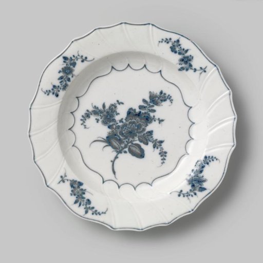 Plate, painted with flower branches and rushes around the central field and rim