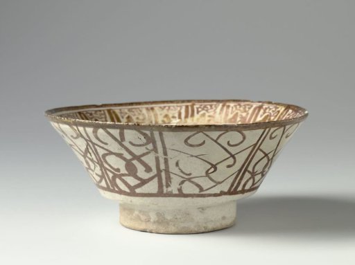 Bowl with a horseman and scrolls