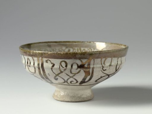 Bowl with scrolls and waving lines
