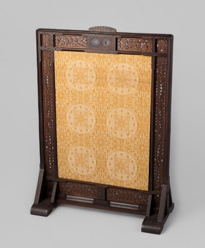 Fire screen of rosewood and violetwood, partially gilded, inlaid with lapis lazuli and upholstered in yellow Jaquard fabric.
