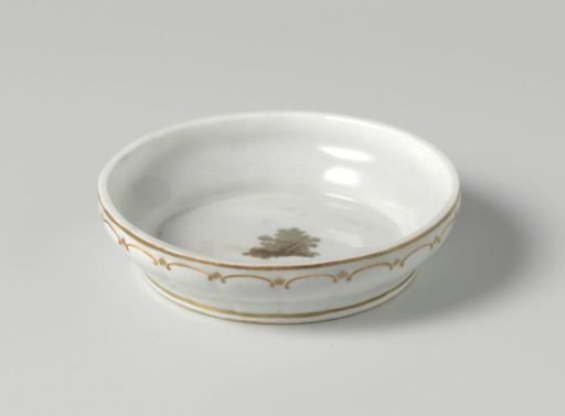 Two ornamental flower pots (cache-pots) on saucers
