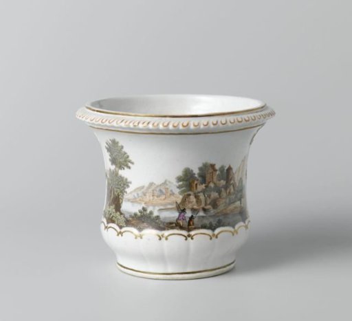 Two ornamental flower pots (cache-pots) on saucers