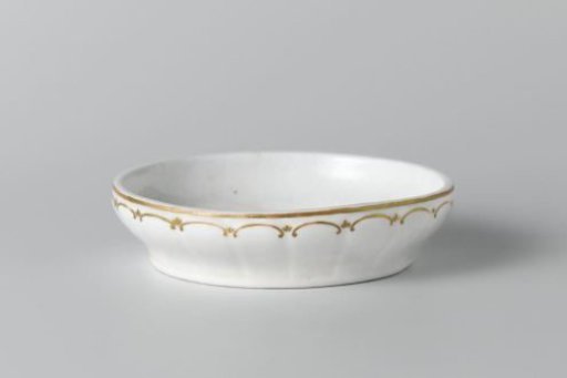 Two ornamental flower pots (cache-pots) on saucers