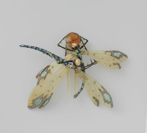 Comb in the form of two dragonflies