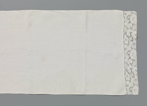 Linen runner with bobbin lace borders at the ends
