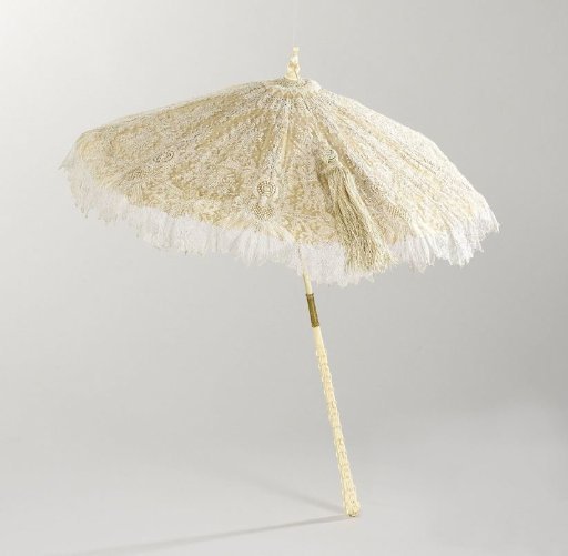 Parasol with cover of 'point de gaze de Bruxelles' needle lace on a handle of ivory, carved as a chain