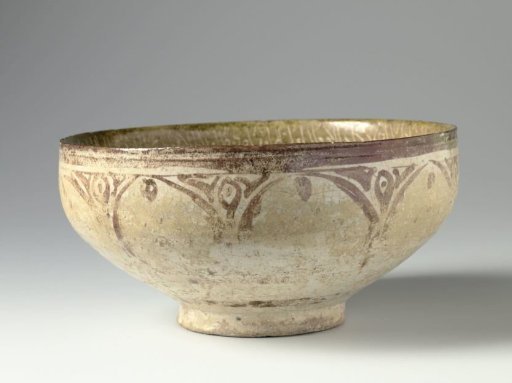 Bowl with an inscription, birds and geomatrical patterns