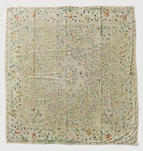 Spread of Eastern textile with embroidery