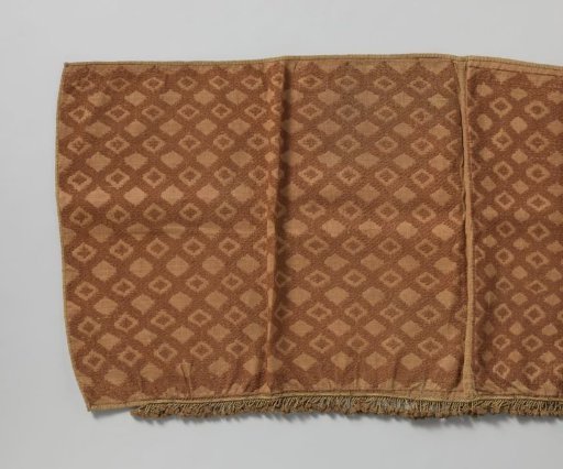 Kubawoven fabric or raffia mat