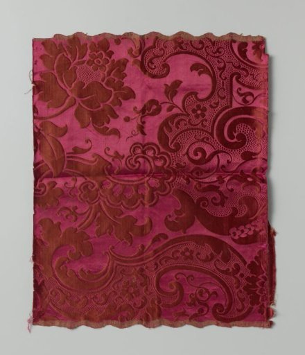 Fragment of red silk weave