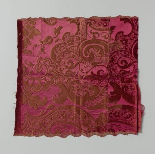 Fragment of red silk textile