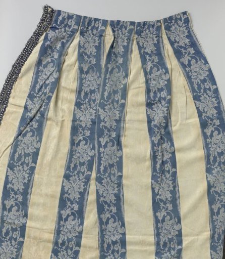 Curtain of blue and white striped linen damask