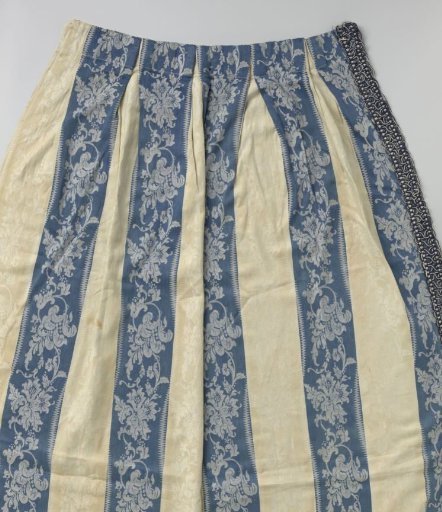 Curtain of blue and white striped linen damask