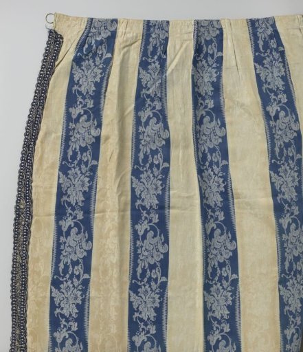 Curtain of blue and white striped linen damask
