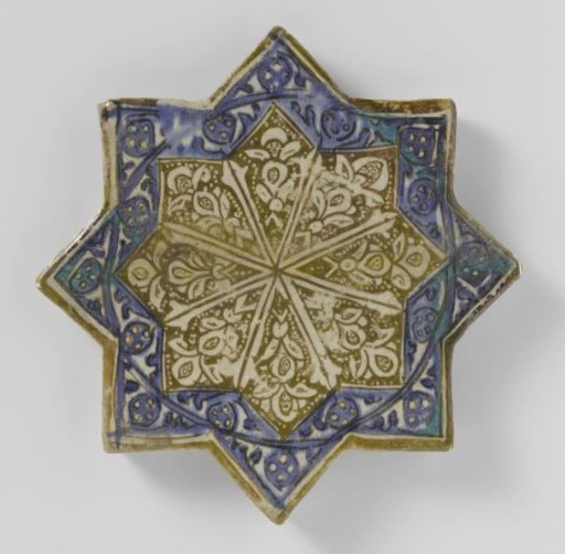 Star-shaped tile with floral scrolls