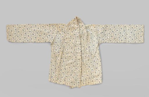 Cotton kabaja with blue floral and leaf motif on white ground