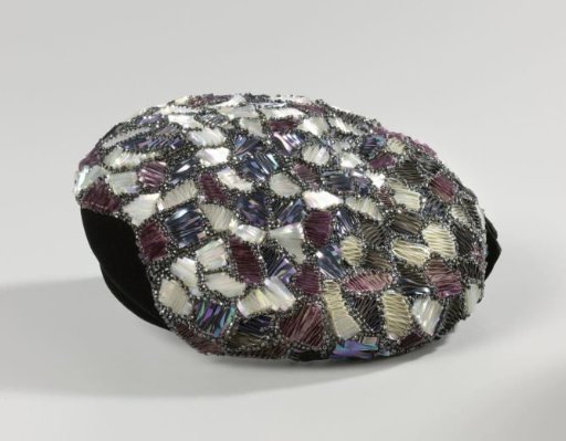Flat Cap with Patchwork Motif of Folded Strips of Plastic in Pearl, Copper and Metallic Between Grey Beads, Decorated with Black Velvet at the Front Center and a Black Velvet Bow at the Back Center