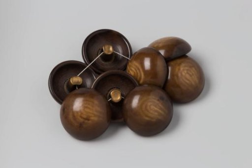 Buttons (8 pieces), spherical, made of brown and beige plastic (celluloid?) with a copper eye