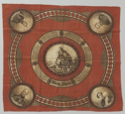 Commemorative handkerchief of red cotton with a black printed medallion featuring the personification of the "Watch on the Rhine", the text of the song, and a royal portrait in each of the four corners