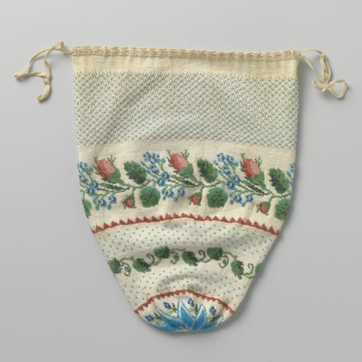 Reticule of ecru-colored knitted cotton decorated with blue, green and red beads, including a band with flowers and branches and a blue star on the underside