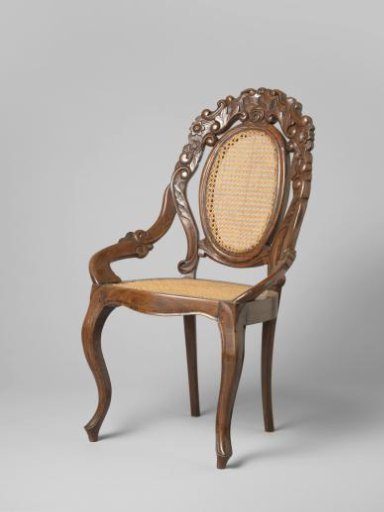 Armchair in neo-rococo style made of jatoba wood with a rattan seat and back