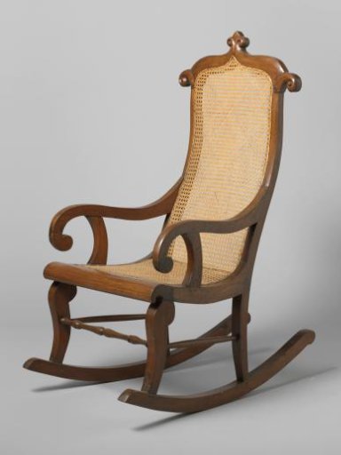 Rocking chair made of djati wood, upholstered with rattan