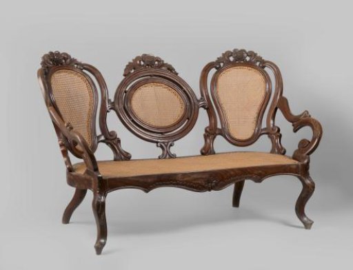 Neo-rococo style sofa made of djati wood with rattan-covered seat and backrests