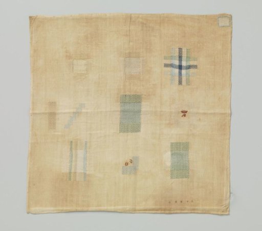 Mending patch of multicoloured silk on linen.
